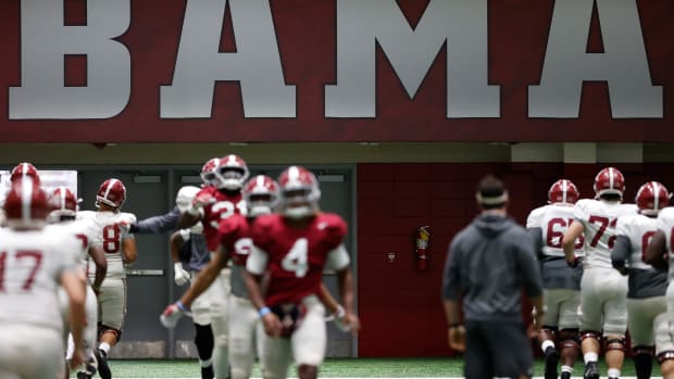 Alabama indoor practice with Bama sign in background, Nov. 11, 2020